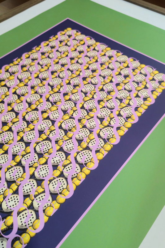 Perspective view close-up of the "Movement citrus yellow" art print, highlighting the high-quality print finish, dark navy center with padel rackets and balls, lilac border line, and wooden frame edge