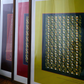 Trio of framed "Skarele / Rituals" digital art prints in matching dark wooden frames, showing colorful poster designs in pistachio green, deep red, and dark purple arranged together in an interior setting