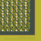 Close-up detail of the "Evening pistachio green" art print, highlighting the intricate pattern of green grapes, yellow cocktails, dark grey border, and lower text "SKARELE / RITUALS - harmony of evening elegance, deep conversation, and rich stories