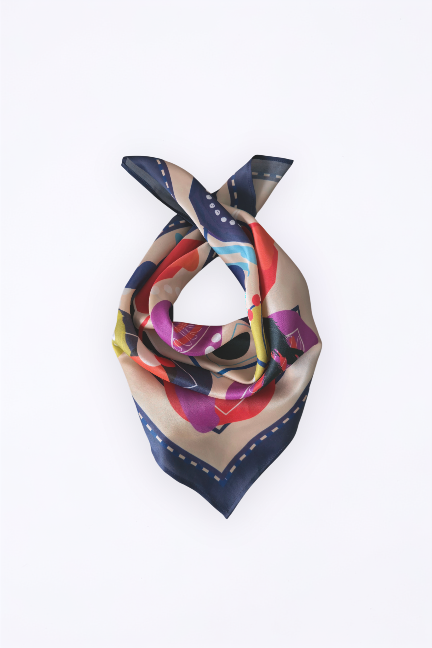 Elegant draped Borzoi Edition silk scarf tied in a loop. Features a cream base with vibrant abstract geometric prints and a dark blue purple dashed border on a clean white background.
