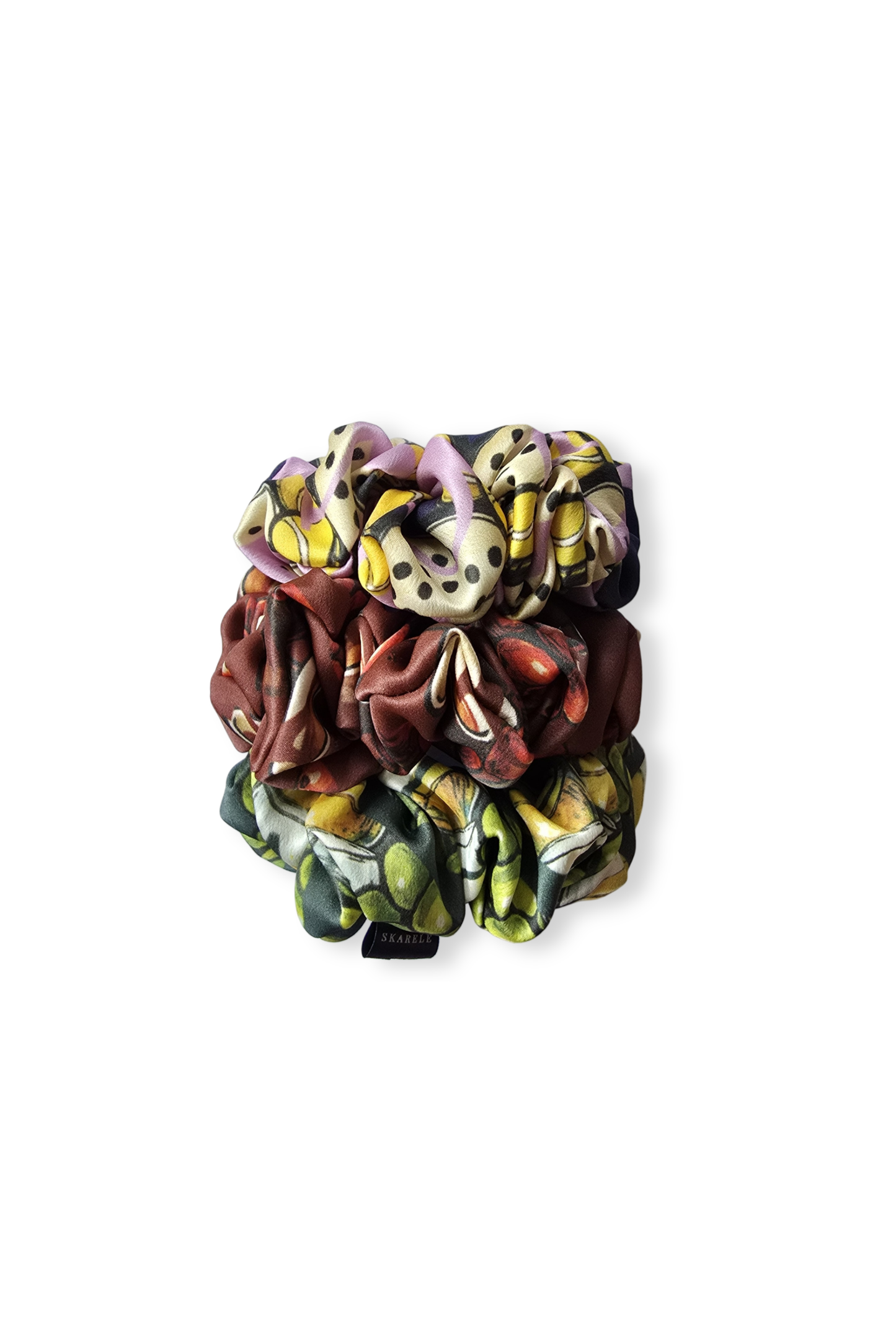 Colorful hair silk scrunchies with floral design on a white background