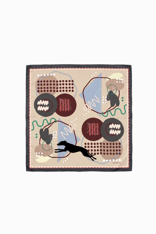 A square scarf with a beige background and a dark grey border, featuring an abstract pattern of dark red circles, brown textured blocks, a black whippet dog silhouette, and light blue curved shapes.