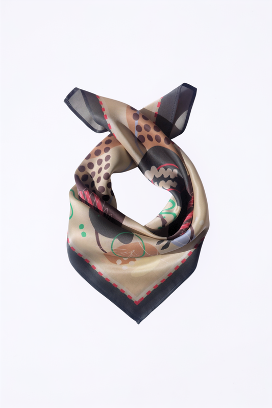 A square silk scarf with a complex abstract pattern featuring beige, brown, black, green, grey and red, tied in a knot against a plain white background.