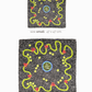 Size comparison layout for Skarele La Dolce Vita viscose and silk blend scarf. Small 47x47 cm and large 70x70 cm versions of the dark charcoal-brown summer patterned scarf are shown vertically on a white background.