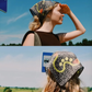 Two-image collage showing a woman wearing the Skarele La Dolce Vita silk scarf under a bright blue sky. Top: Side profile looking out. Bottom: Back view showing the yellow graphic pattern.