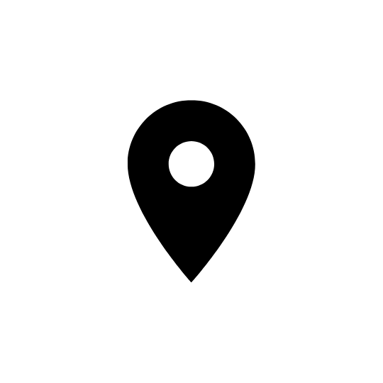 A solid black map pin icon with a white circle in the center, isolated on a white background. This minimalist vector illustration represents location, GPS coordinates, and destination points.